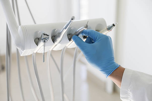 Professional Emergency Dentist technician working in Islamorada Village of Islands, FL